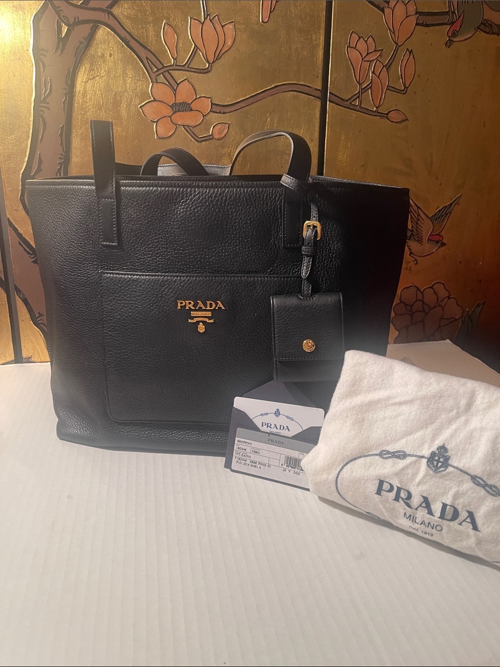 Prada Black Leather Tote with Gold Logo Accent
VIT. DAINO